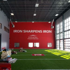 D1 Sports Holdings Iron Sharpens Iron